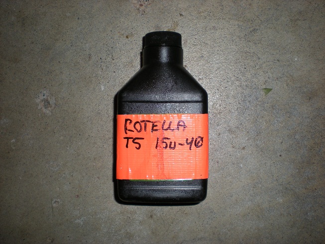 Who hates carrying more oil than your engine holds? That quart takes up valuable glovebox space. 8oz 2T oil bottle recycled after making premix for the weedwacker.