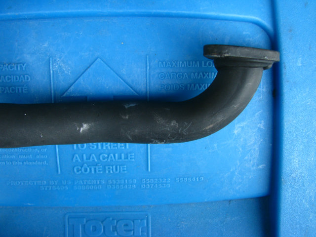Stock header pipe. Note distance between the bend and the mounting flange.
