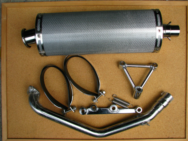 Stainless steel/aluminum/fiberglass weave performance exhaust system.