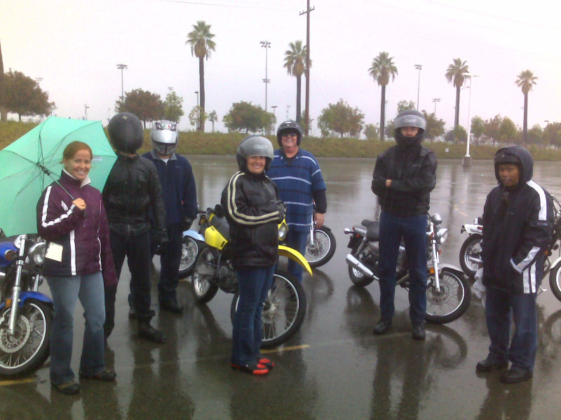 Graduation in the rain... we all passed :-). Instructor Christy on left. I'm taking the photo.