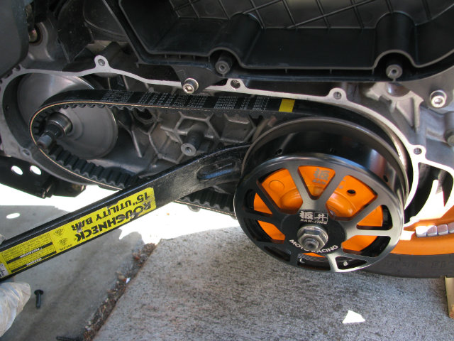 New clutch bell installed. I used a pry bar to force contra pulley plates apart so that the belt could be pushed deeper into pulley thereby allowing the belt to fit over variator/crank shaft.