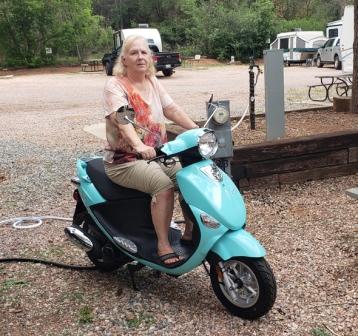 Deb on scoot 2.jpg