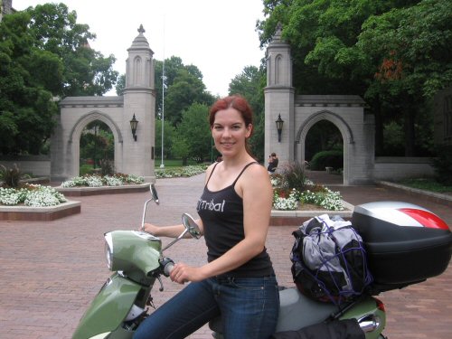 At the Sample Gates that welcome folks to Indiana University's campus (photo taken by a lovely couple who came over to ask me about 'the neatest scooter set-up they'd seen, with the case and the saddle bags and the nice green color')