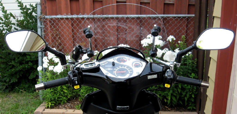 Dash side view of Genuine Cuppini windscreen, GPS mount, &amp;amp; mirror configuration.