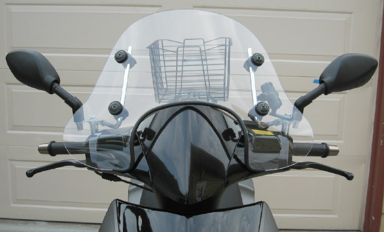 Front view of Genuine Cuppini Buddy Short windscreen mounted on '07 Blur scooter. (This windscreen has been cut down for a 5'1&amp;quot; rider.)