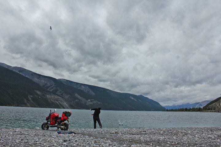 Skipping rocks at a mountain lake on the Alaska Highway.