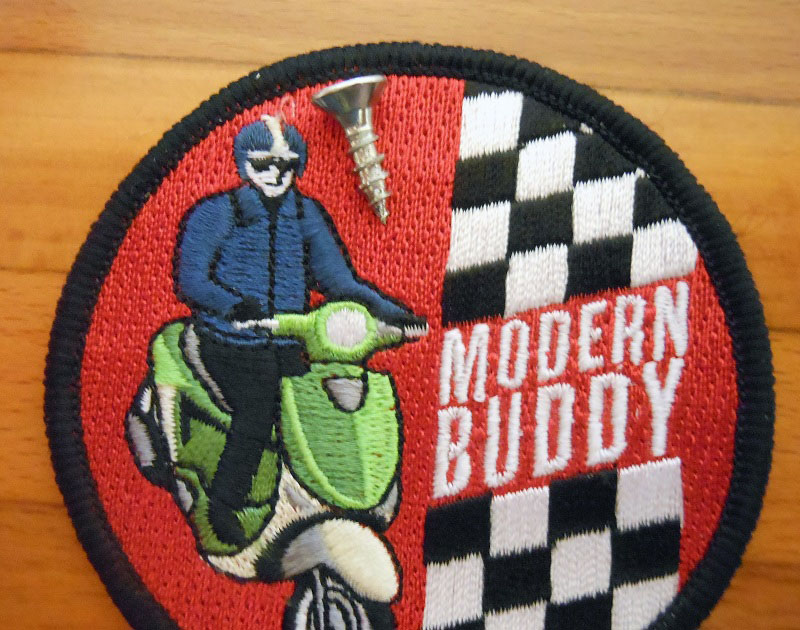 Screw, on a Modern Buddy patch (you should pick one up.  The patch, as well as the screw.) for scale.