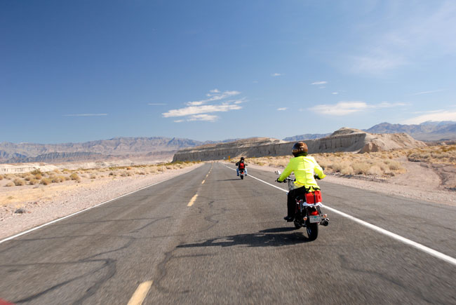 Arlene B. (GoGoGear) and Joe Berk (California Scooter Co.) heading in to Death Valley.