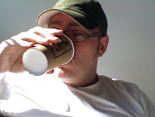 Doing what I do best in the mornin', guzzlin' coffee.