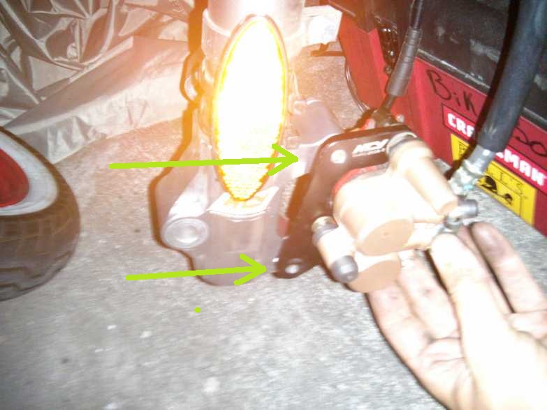Black plate in photo is what I'm referring to in post. Green arrows indicate bolt holes.