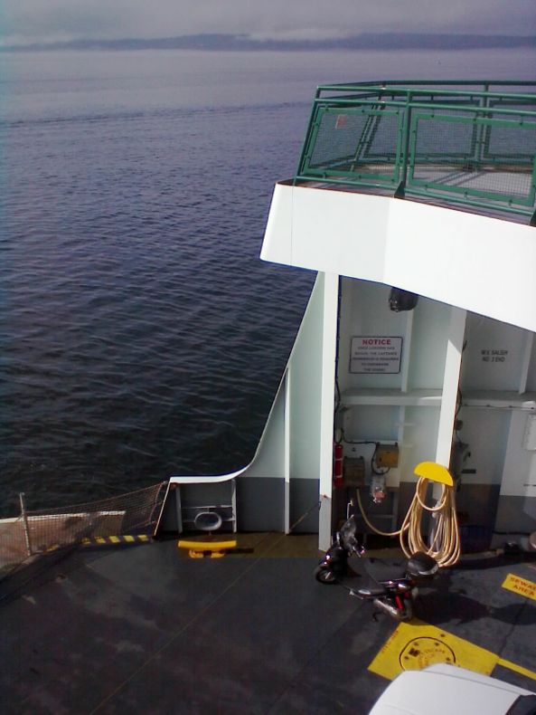 At the front of the ferry.