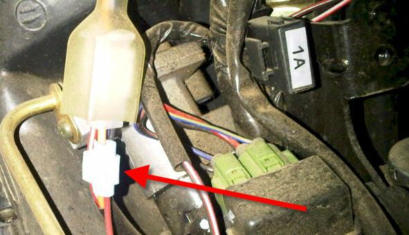 Positive from a large orange wire; it might be the starter wire.  I used a wire splice.  Either connect two wires in the wire splice (one for each deadlight) or use a wire nut to connect the one wire from the photo to two wires (one for each deadlight).