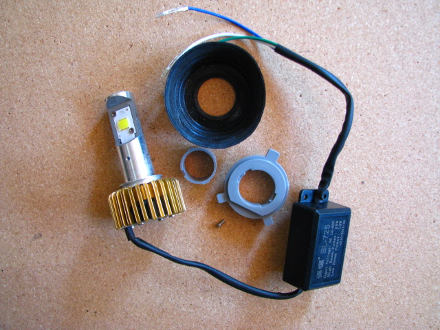 LED unit with H4 mounting adapter. I ended up not using the rubber weather shield.