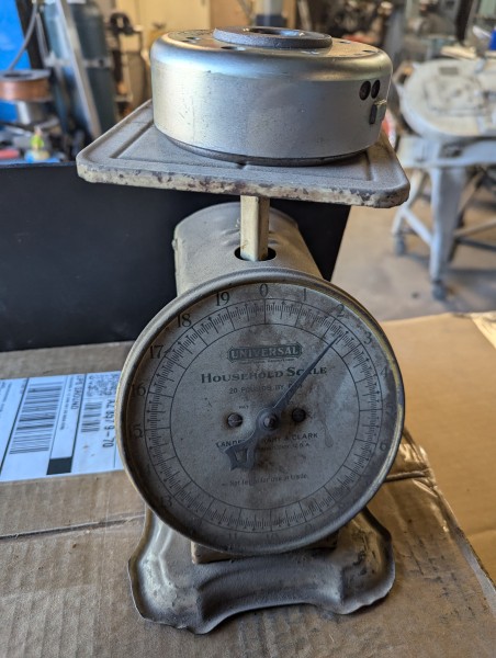 High tech here. I should've taken the picture straight-on to show the correct weight.
