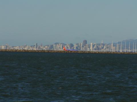 This Is A Shot Of Oakland California<br />Notice The Plane!
