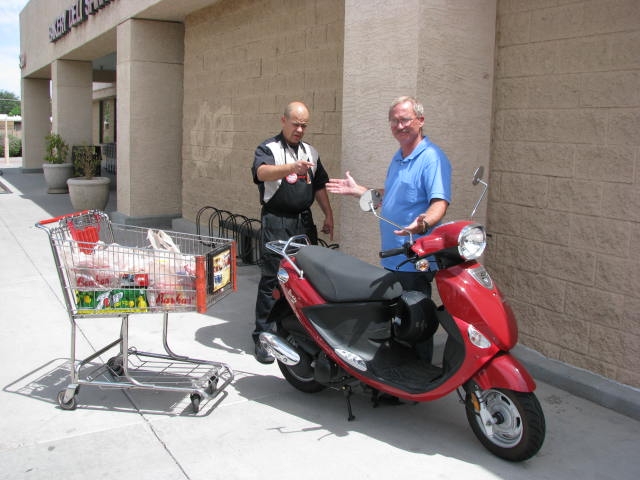 + 1 for parked in front of the store<br />+2 me in the pic<br />+2 scooter in pic<br />+5 parked on the sidewalk<br />+10 store employee telling me off