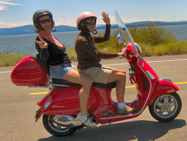 The wife waving me goodbye at Lake Almanor - catching a plane back home in the moring - they still get to play