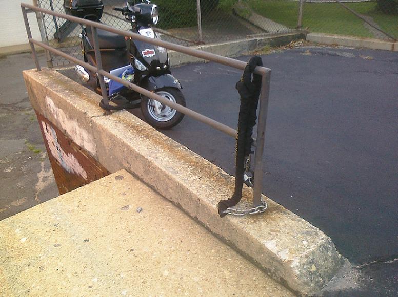 the chain still attached to the railing