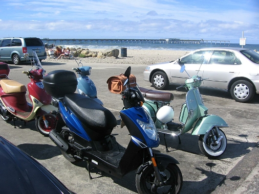 Our scooters with the Ocean Beach Pier on the background. See the two Buddies?