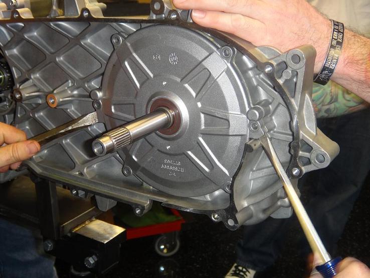 How to remove the clutch; there are tabs to put screw drivers in and pull.