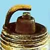 A dark brown spark plug means the engine is running too rich.